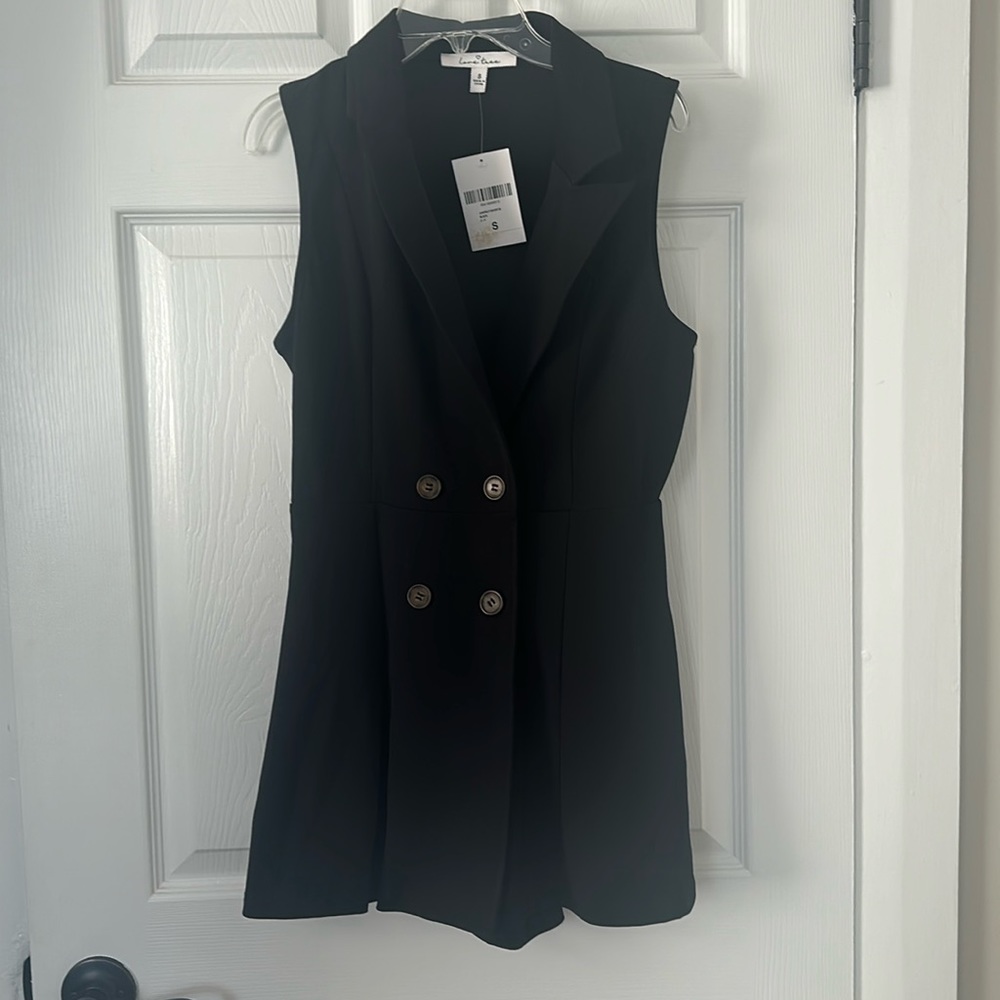 Black sleeveless romper. Never worn. Forever 21 size Small.